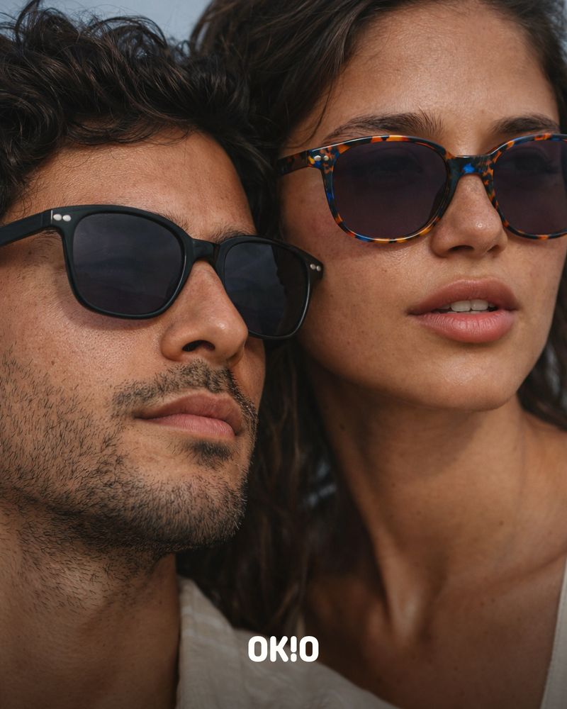 Pareja con lentes de sol OKIO